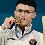 Rizki Juniansyah Atlet Angkat Besi Indonesia Rizki Juniansyah Ditangguhkan Sementara pada Ajang Asian Games 2026